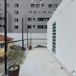 Instalação de rede de proteção em residência